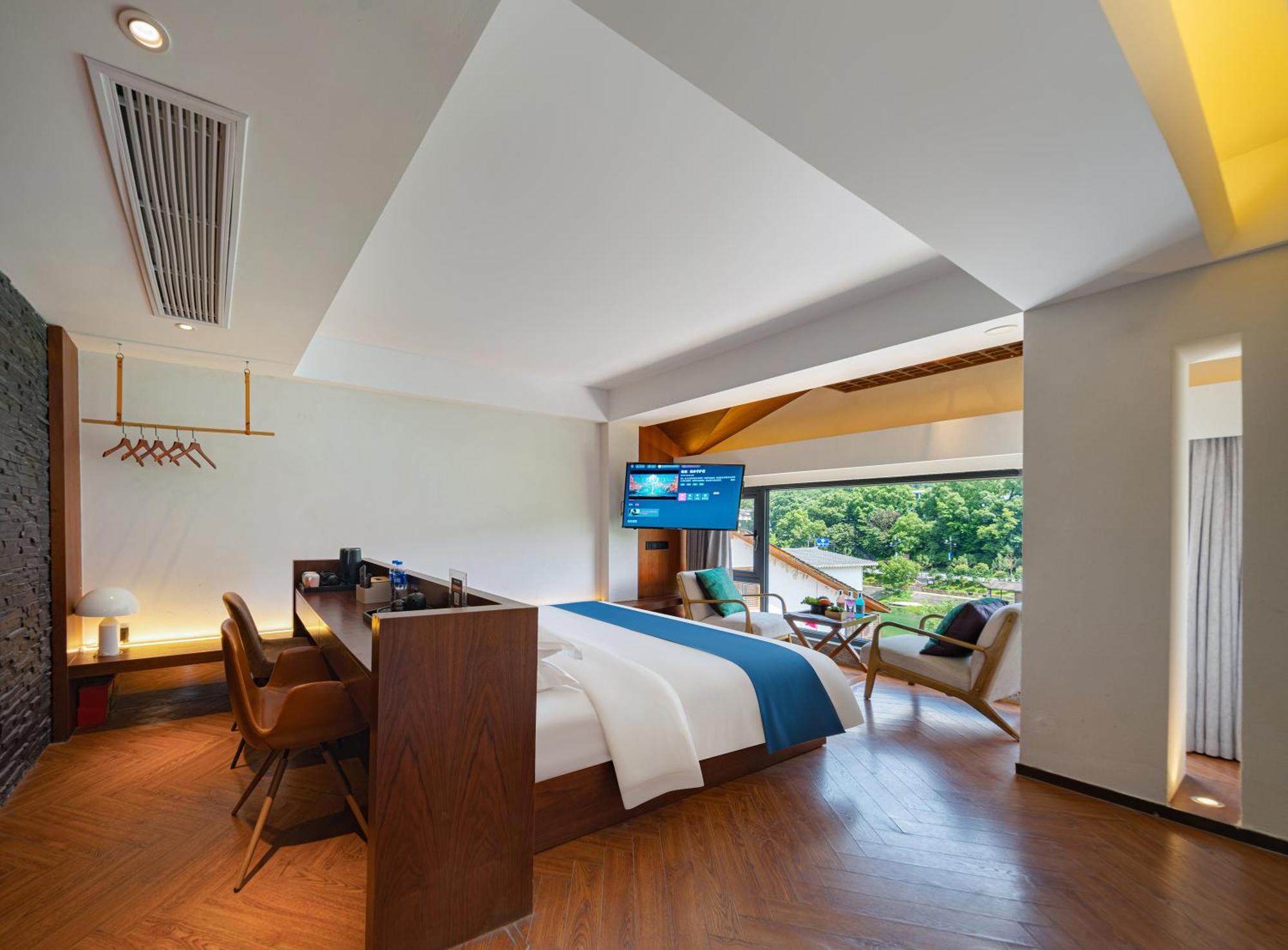張家界武陵源北岸輕奢客棧 森林公園店 Hotel Zhangjiajie Exterior photo