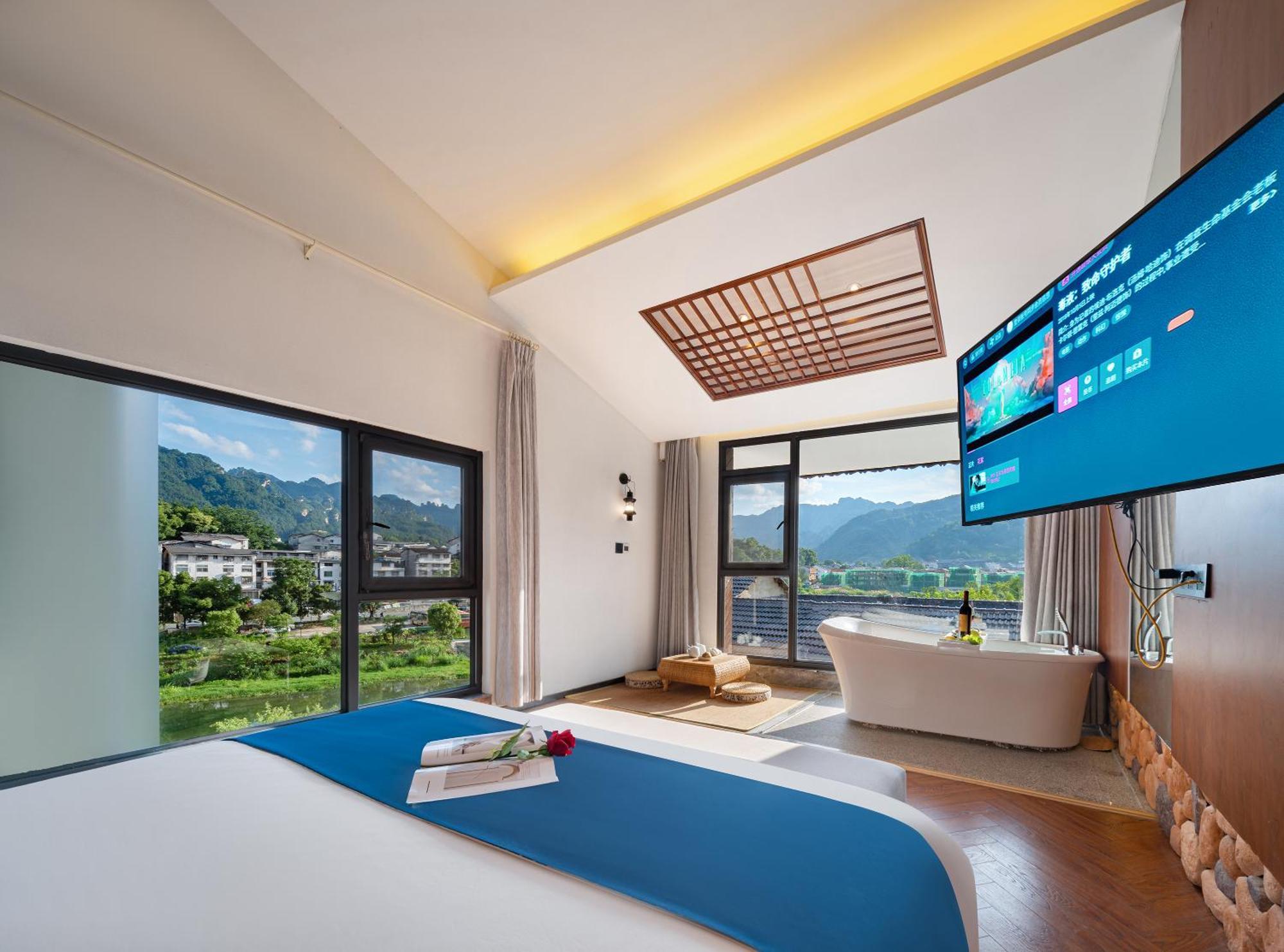 張家界武陵源北岸輕奢客棧 森林公園店 Hotel Zhangjiajie Exterior photo